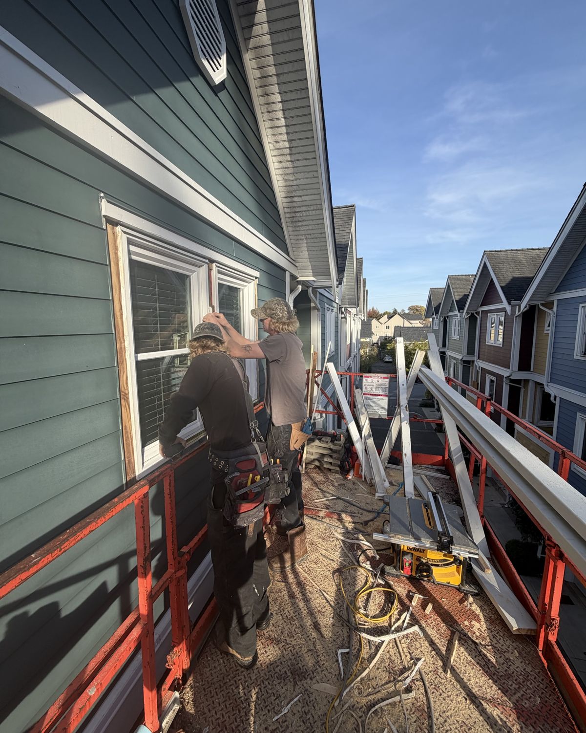Crew working on site on a townhouse exterior renovation